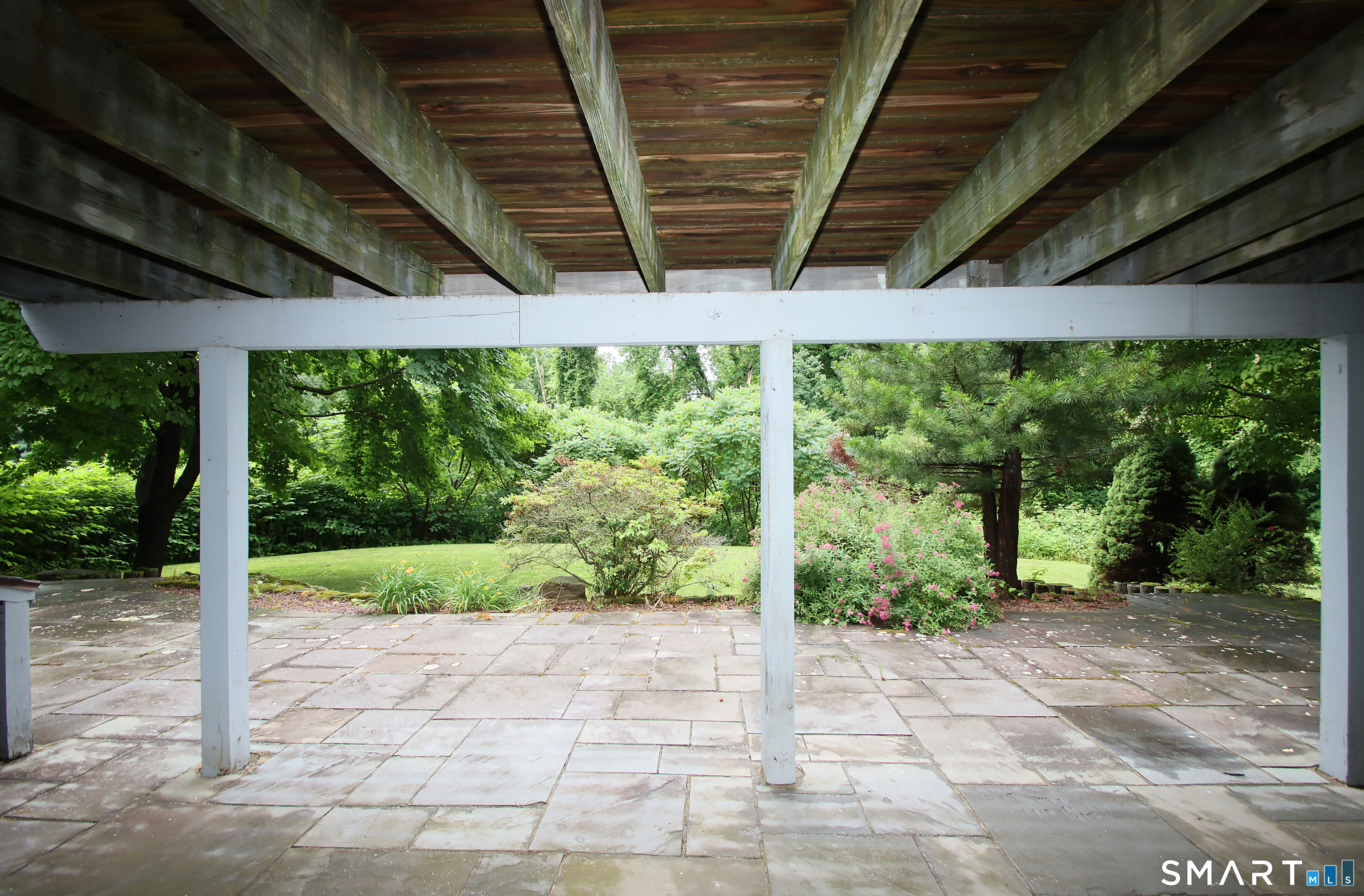 352 Center Street Wolcott, CT 06716 - Photo 34 of 40 a view of a porch with furniture and garden