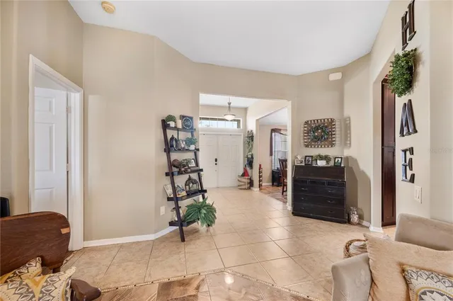 a kitchen with granite countertop sink and cabinets