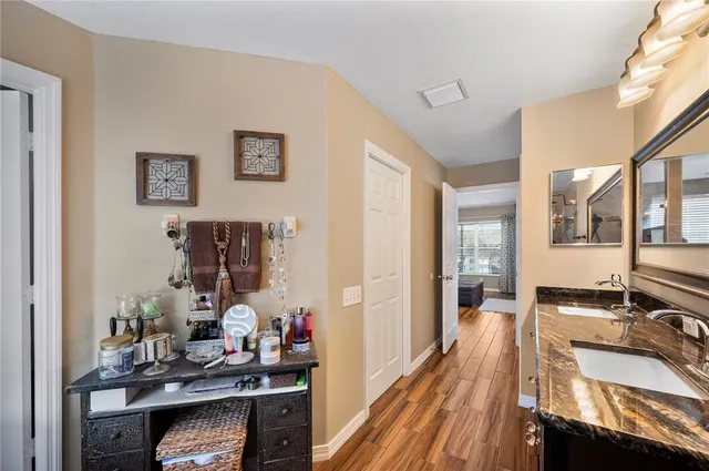 a bathroom with a glass door shower