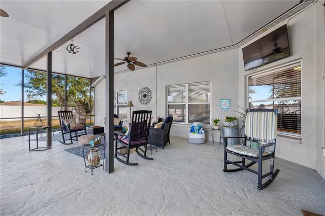 a view of a swimming pool with a lounge chairs