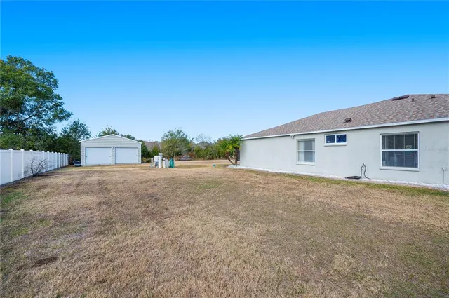 a swimming pool with lake view