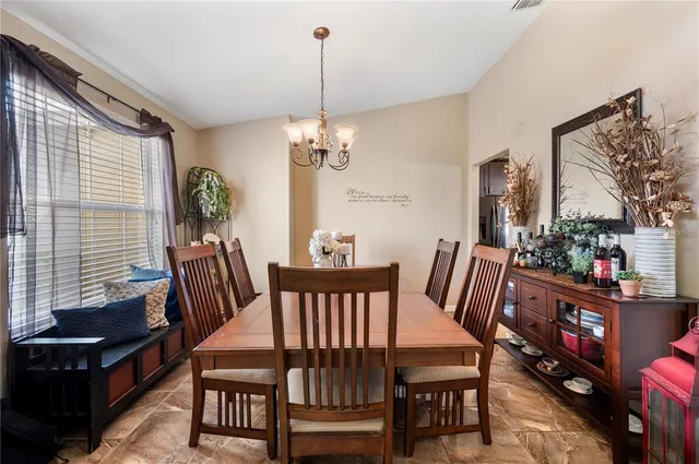 a living room with fireplace furniture and a flat screen tv