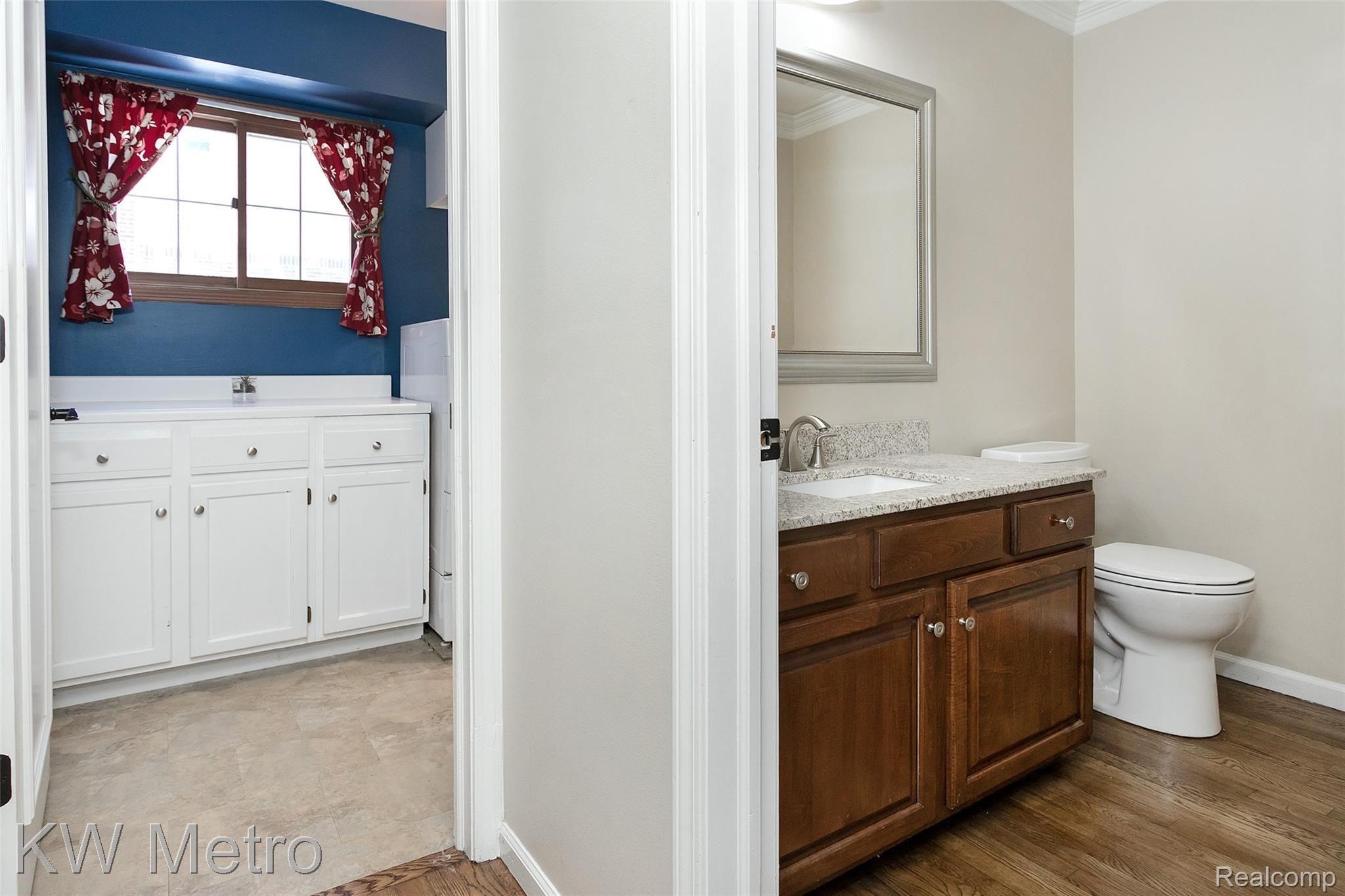 42309 Waterfall Road Northville, MI 48168 - Photo 20 of 58 First Floor Laundry & Half Bath