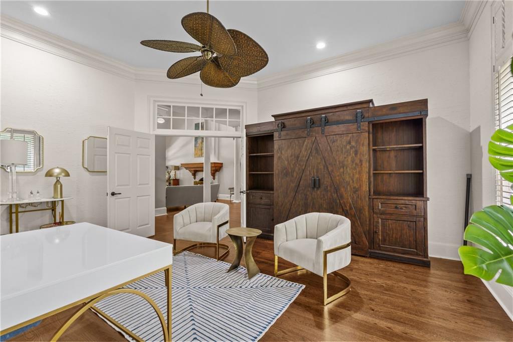 1940 Dinsmore Road Milton, GA 30004 - Photo 23 of 71 a living room with furniture and a chandelier