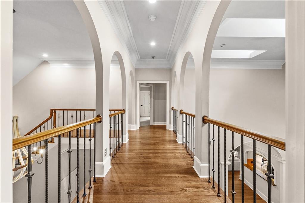 1940 Dinsmore Road Milton, GA 30004 - Photo 37 of 71 a view of a hallway with wooden floor