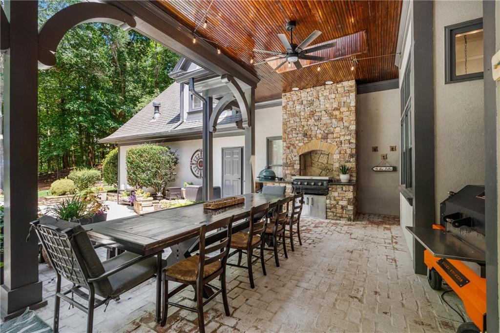 1940 Dinsmore Road Milton, GA 30004 - Photo 52 of 71 a view of an outside dining space with furniture window