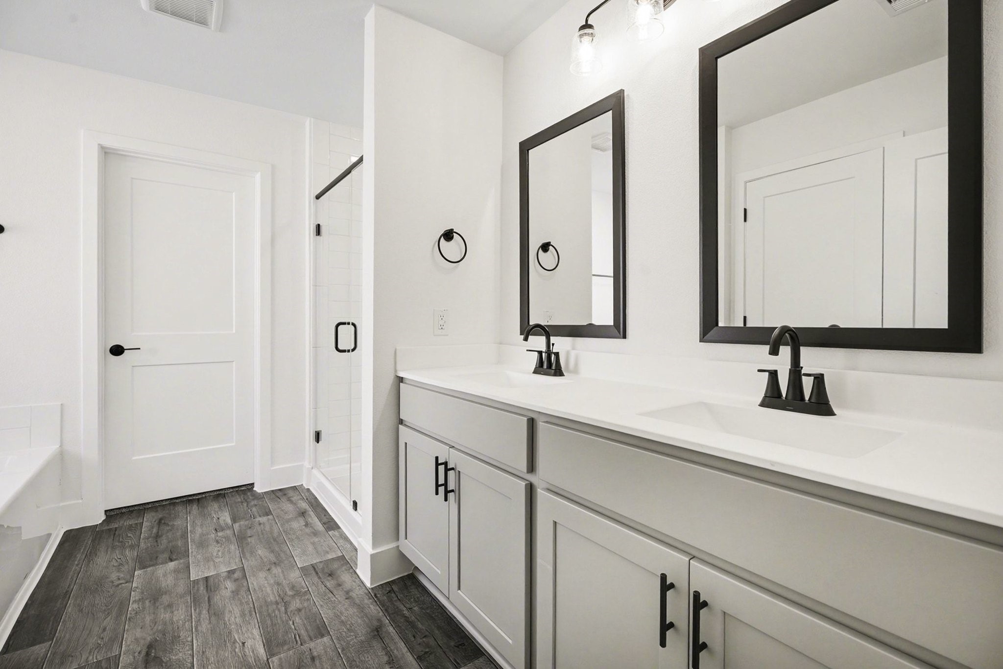 1 Keystone Court Angleton, TX 77515 - Photo 20 of 26 a bathroom with a sink and a mirror