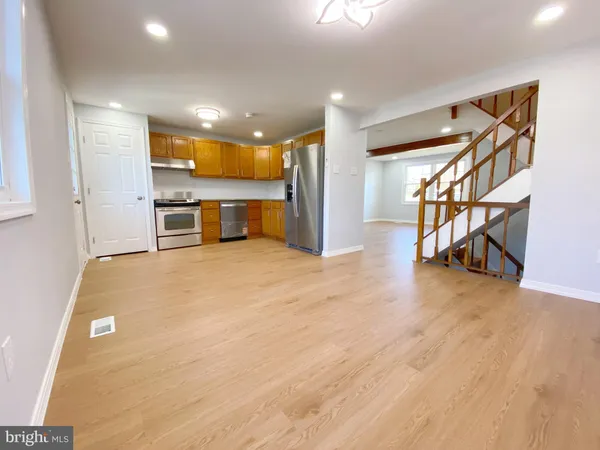 a view of livingroom with hardwood and furniture