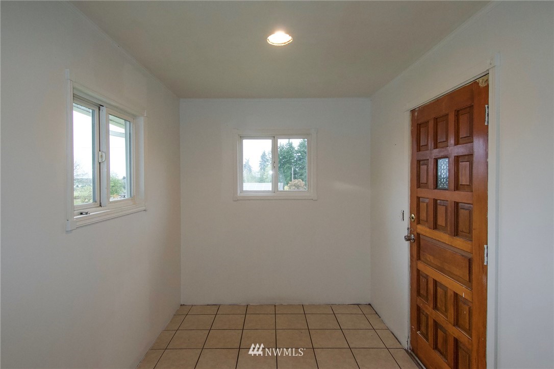 190 Roupe Road Sequim, WA 98382 - Photo 3 of 20 a view of an empty room with a window