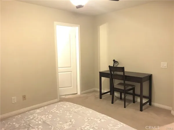 a workspace with furniture and a window