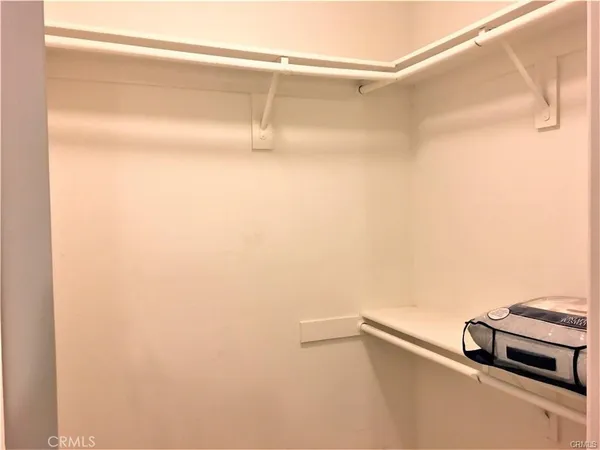 a view of a room with rack on the wall