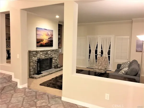 a living room with fireplace