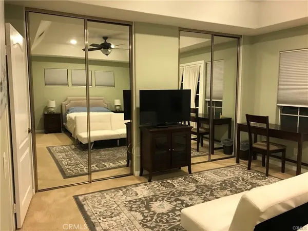 a living room with a couch and a table