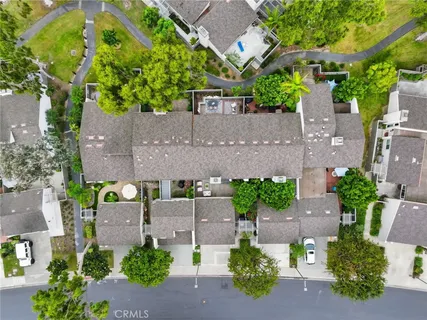 a view of a park with plants and bench