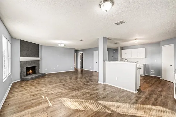 a view of a livingroom with a fireplace
