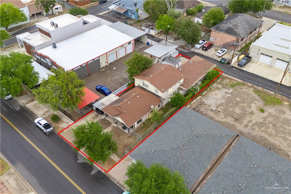 613 South 12th Street McAllen, TX 78501 - Photo 8 of 15 an aerial view of a house with garden space and street view