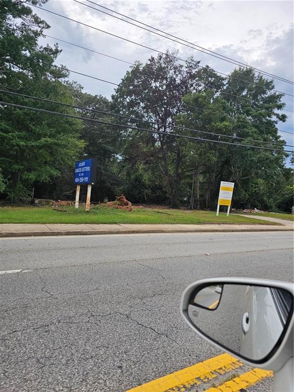 1979 Wesley Chapel Road Decatur, GA 30035 - Photo 7 of 14 a view of swimming pool with a yard and large trees
