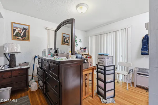 a room with a chair and furniture