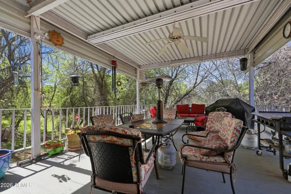 a view of outdoor dining space with furniture and outdoor space