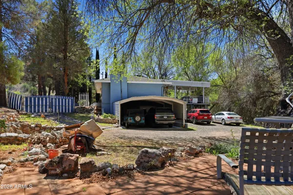 a view of street with parked cars