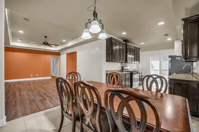 a view of a dining room with furniture
