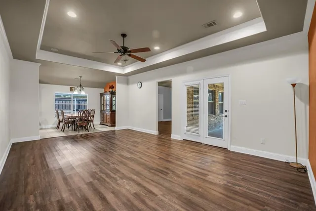 a view of a livingroom with wooden floor