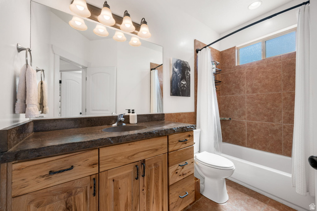 62 North Lucky 7 Road Veyo, UT 84782 - Photo 21 of 43 Full bath featuring vanity, shower / bath combination with curtain, and tile patterned flooring