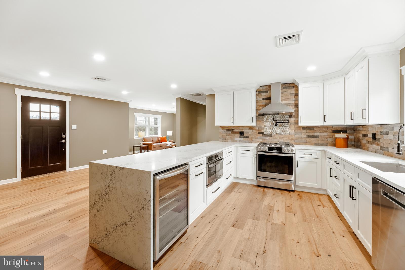 4448 Lower Mountain Road New Hope, PA 18938 - Photo 15 of 49 a large kitchen with stainless steel appliances granite countertop a stove and a sink