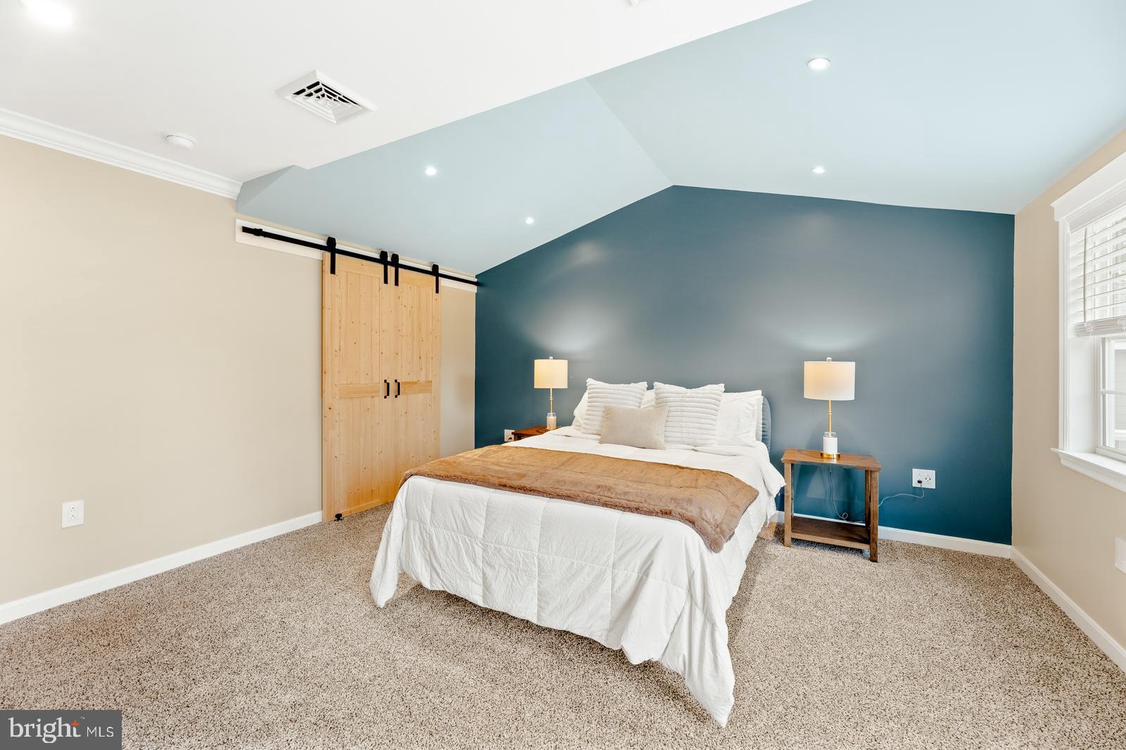 4448 Lower Mountain Road New Hope, PA 18938 - Photo 22 of 49 a bedroom with a bed and a lamp