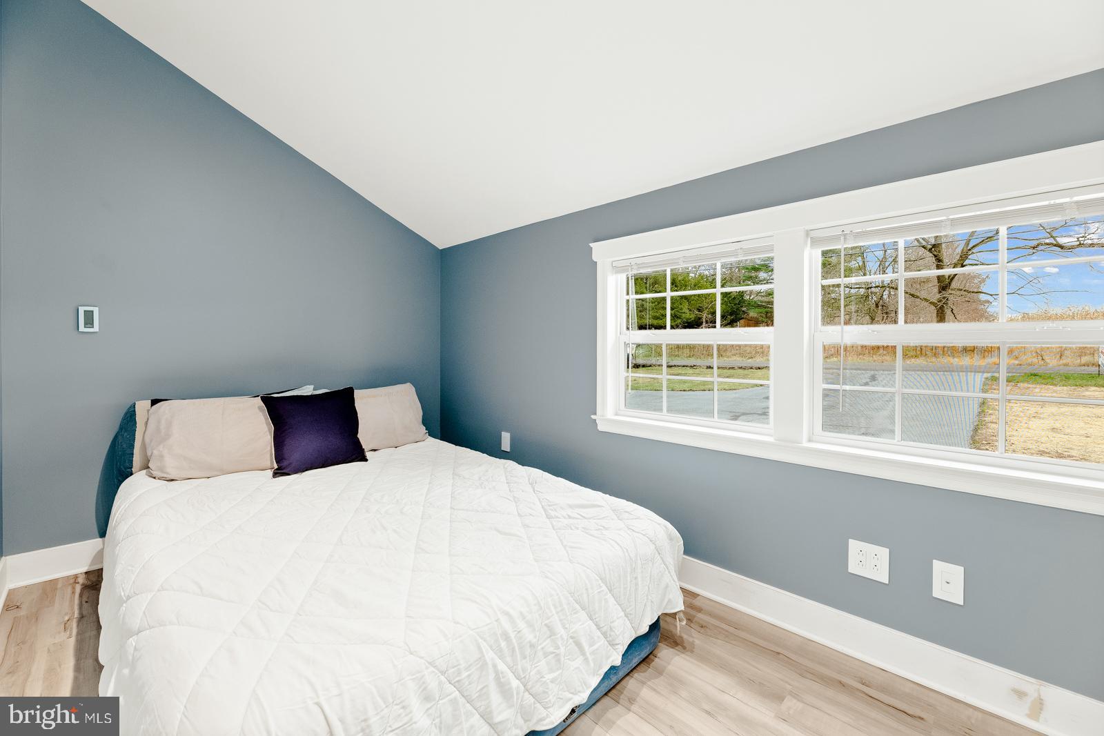 4448 Lower Mountain Road New Hope, PA 18938 - Photo 38 of 49 a large bed sitting in a bedroom next to a window