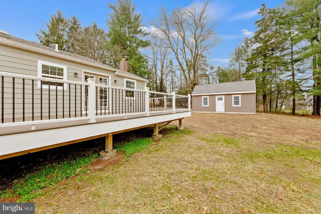 a house with trees in front of it