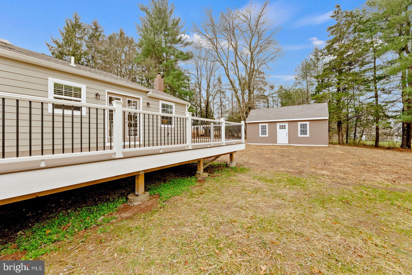 4448 Lower Mountain Road New Hope, PA 18938 - Photo 44 of 49 a house with trees in front of it
