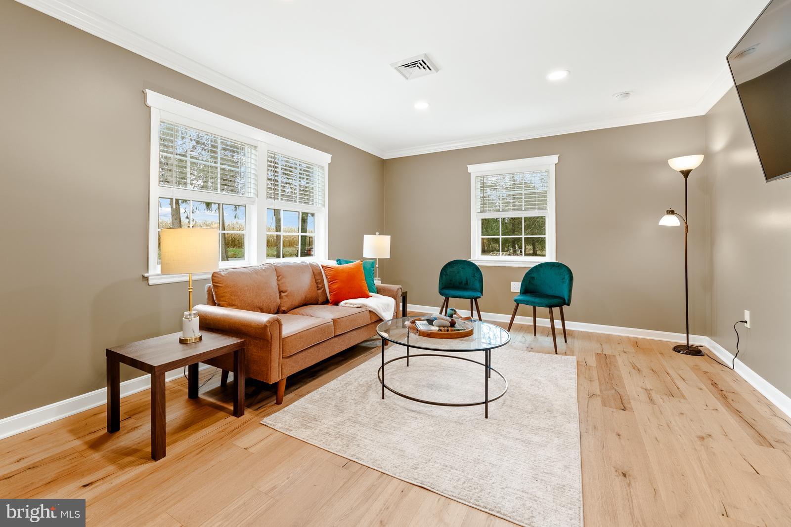 4448 Lower Mountain Road New Hope, PA 18938 - Photo 6 of 49 a living room with furniture and wooden floor