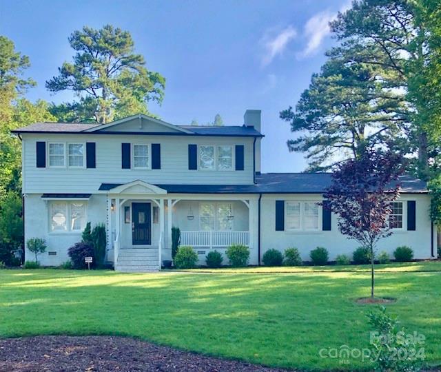 5710 Lansing Drive Charlotte, NC 28270 - Photo 1 of 1 a front view of a house with a garden