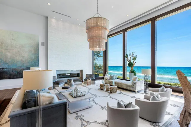 a kitchen with stainless steel appliances granite countertop a stove and a wooden floors