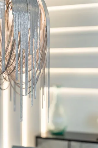 a view of a hallway with a glass door and porch