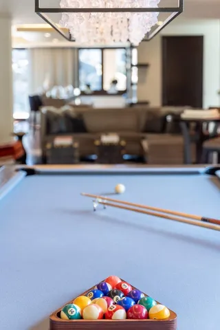 a front view of a house with a yard table and chairs