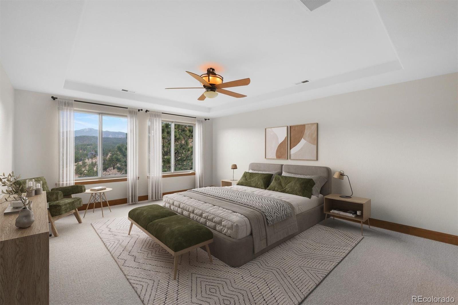 3191 Bittersweet Lane Evergreen, CO 80439 - Photo 12 of 40 a bedroom with a large bed and a large window