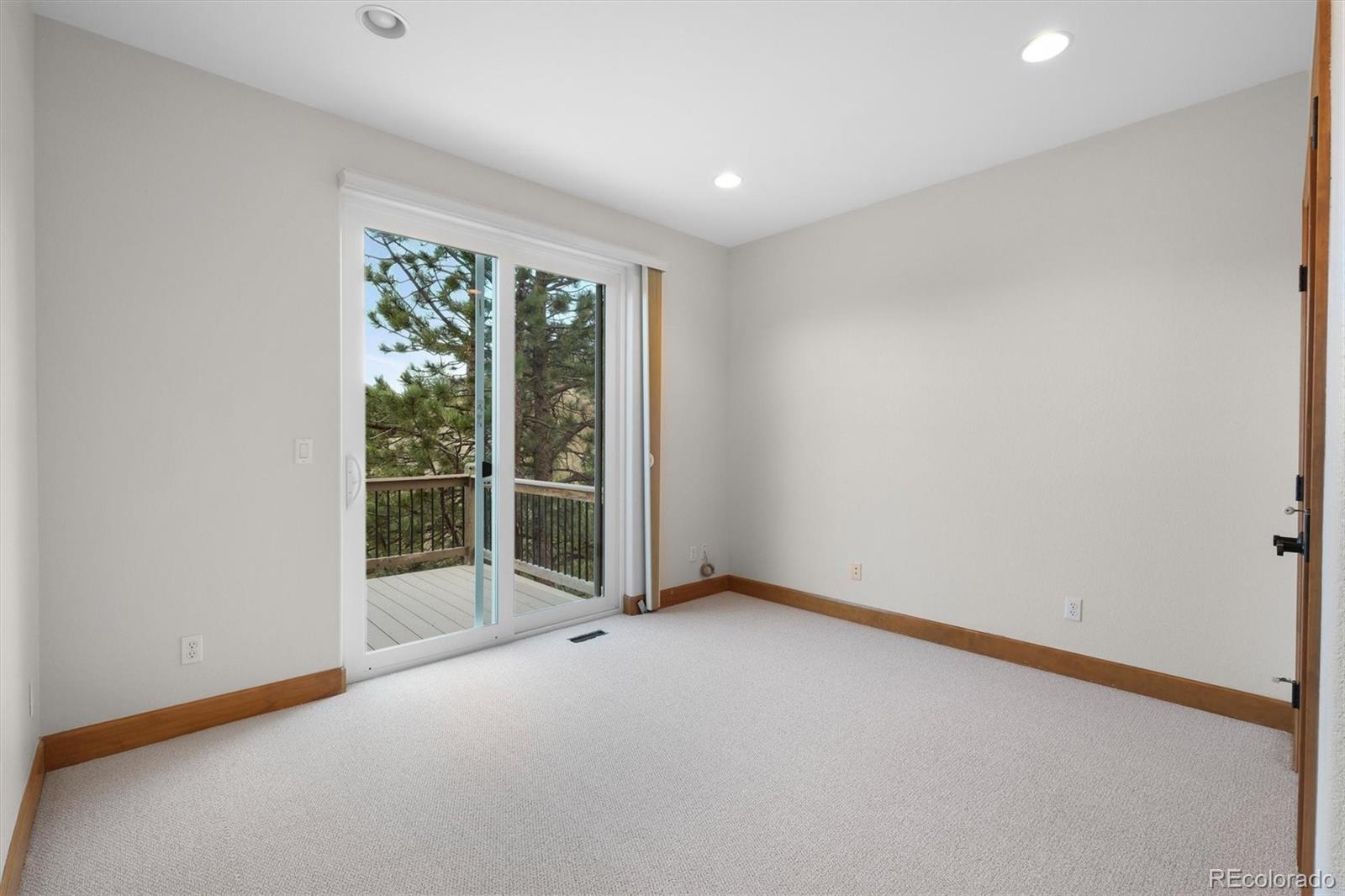 3191 Bittersweet Lane Evergreen, CO 80439 - Photo 10 of 40 a view of an empty room with a window