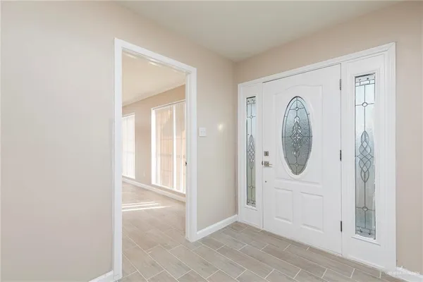a view of a hallway with entryway