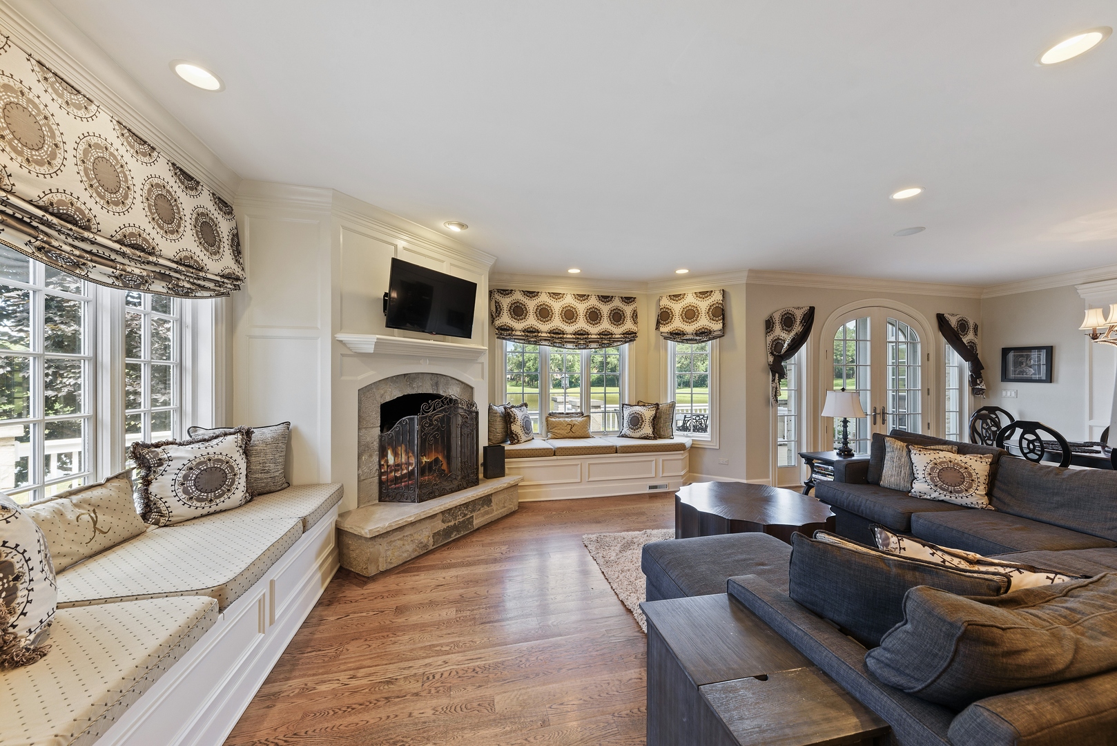 35 Riderwood Road North Barrington, IL 60010 - Photo 12 of 35 a living room with furniture fireplace and flat screen tv