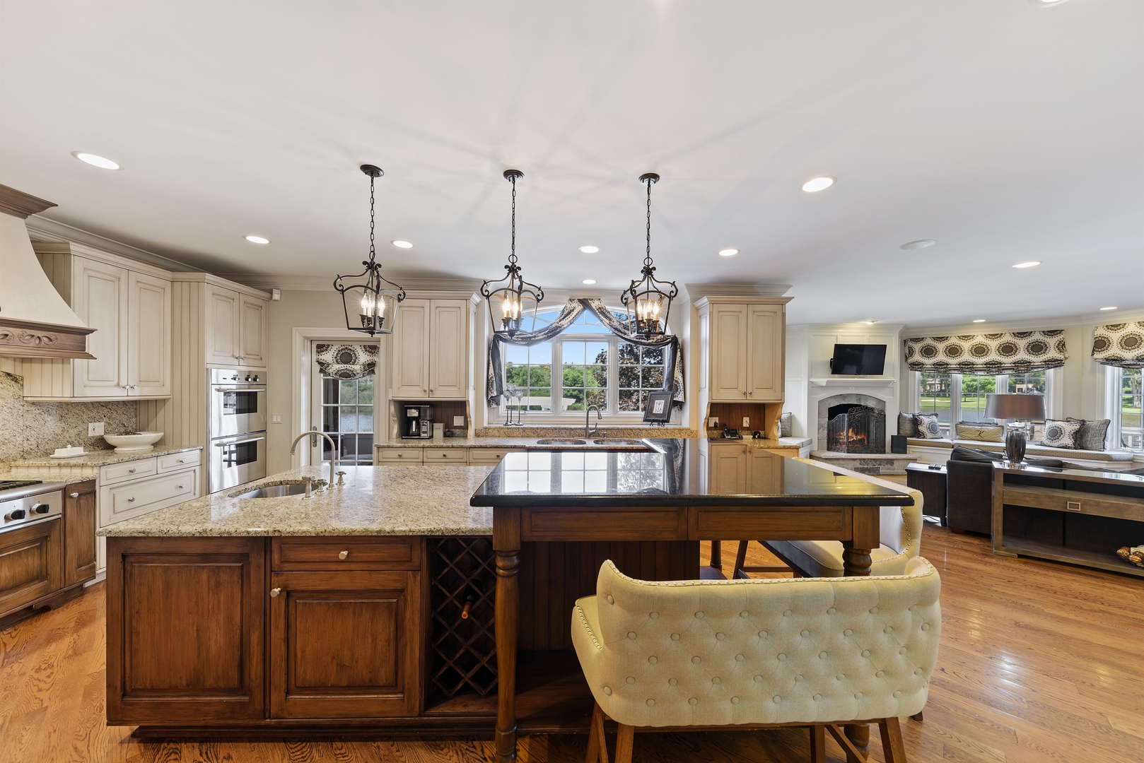 35 Riderwood Road North Barrington, IL 60010 - Photo 8 of 35 a large kitchen with kitchen island granite countertop a large counter top stainless steel appliances and cabinets