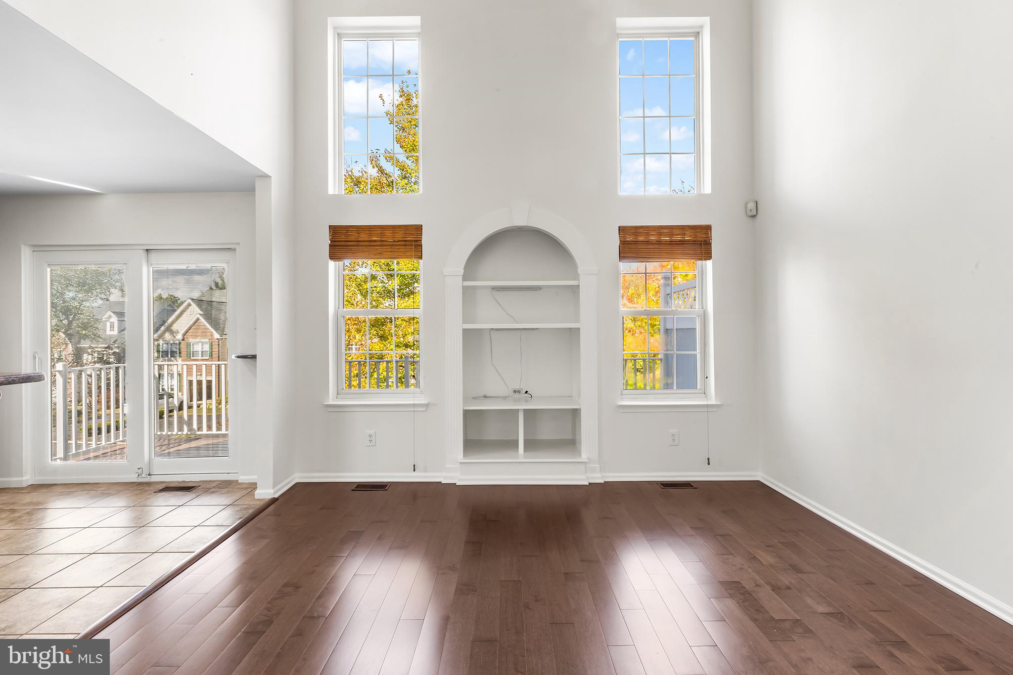 272 Militia Drive Wayne, PA 19087 - Photo 15 of 57 an empty room with wooden floor and windows