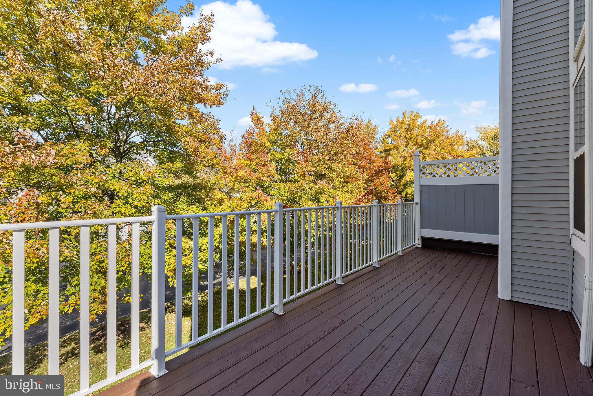 272 Militia Drive Wayne, PA 19087 - Photo 23 of 57 a view of a balcony with wooden floor and fence