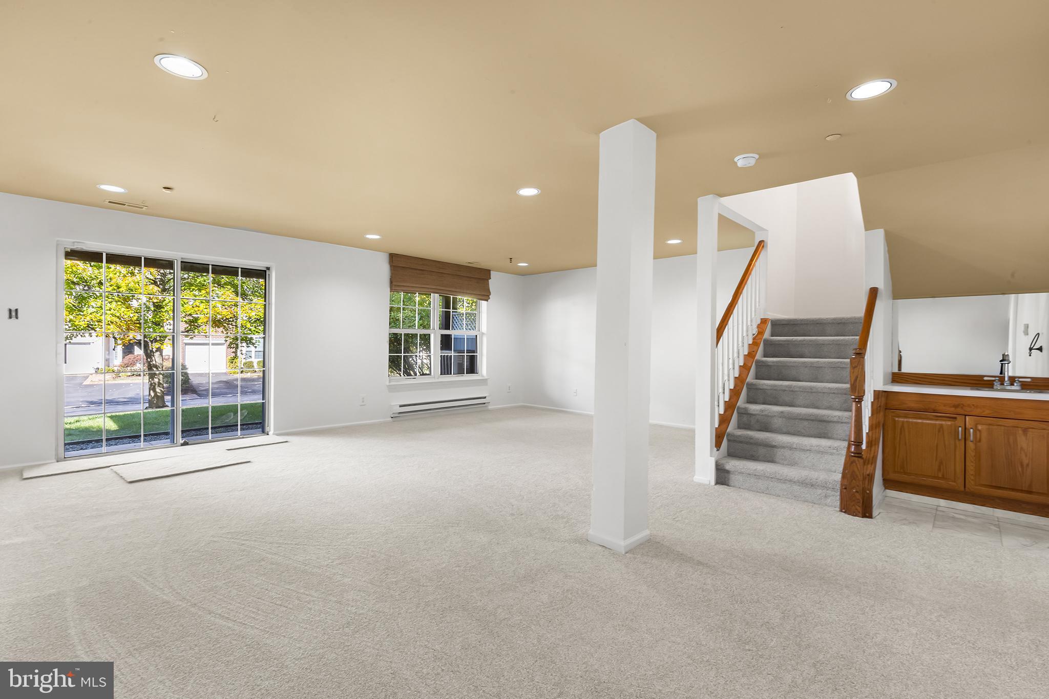 272 Militia Drive Wayne, PA 19087 - Photo 26 of 57 a view of a livingroom with a staircase