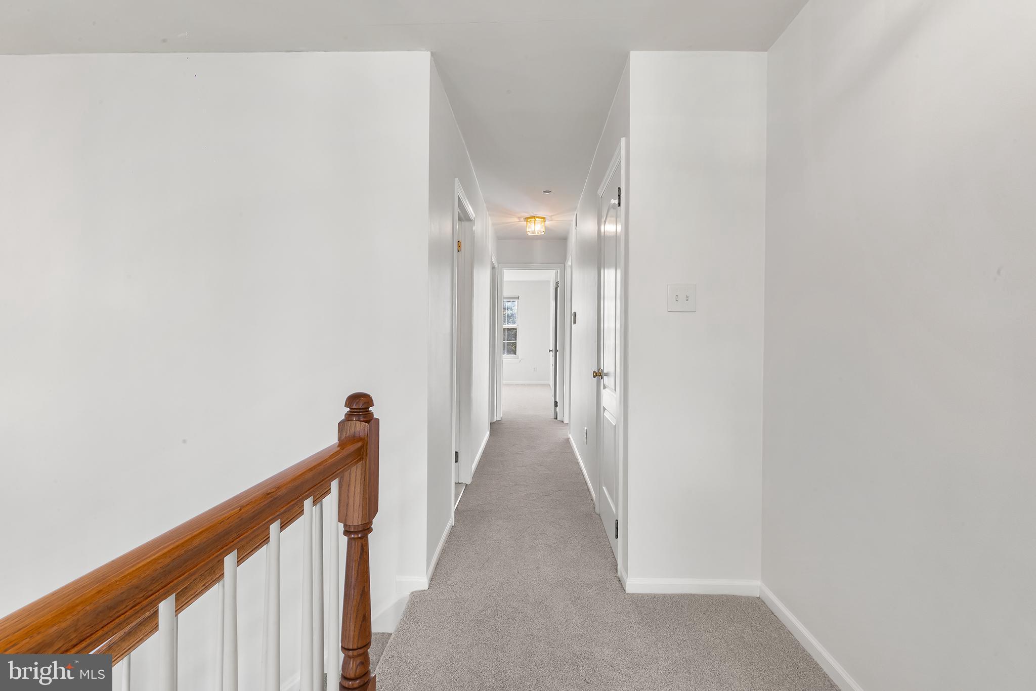 272 Militia Drive Wayne, PA 19087 - Photo 38 of 57 a view of a hallway with wooden floor