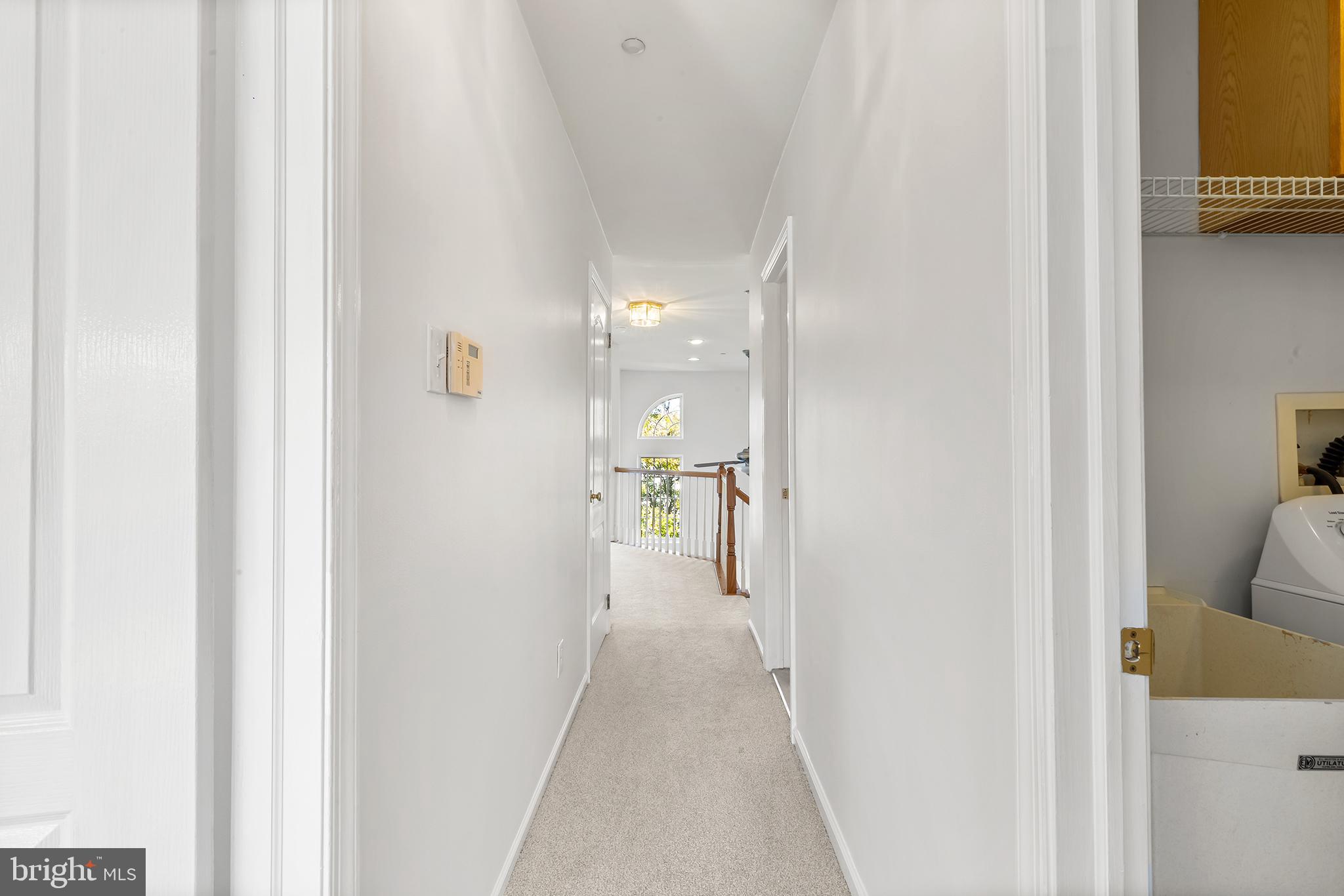 272 Militia Drive Wayne, PA 19087 - Photo 39 of 57 a view of a hallway with a livingroom and a bathroom