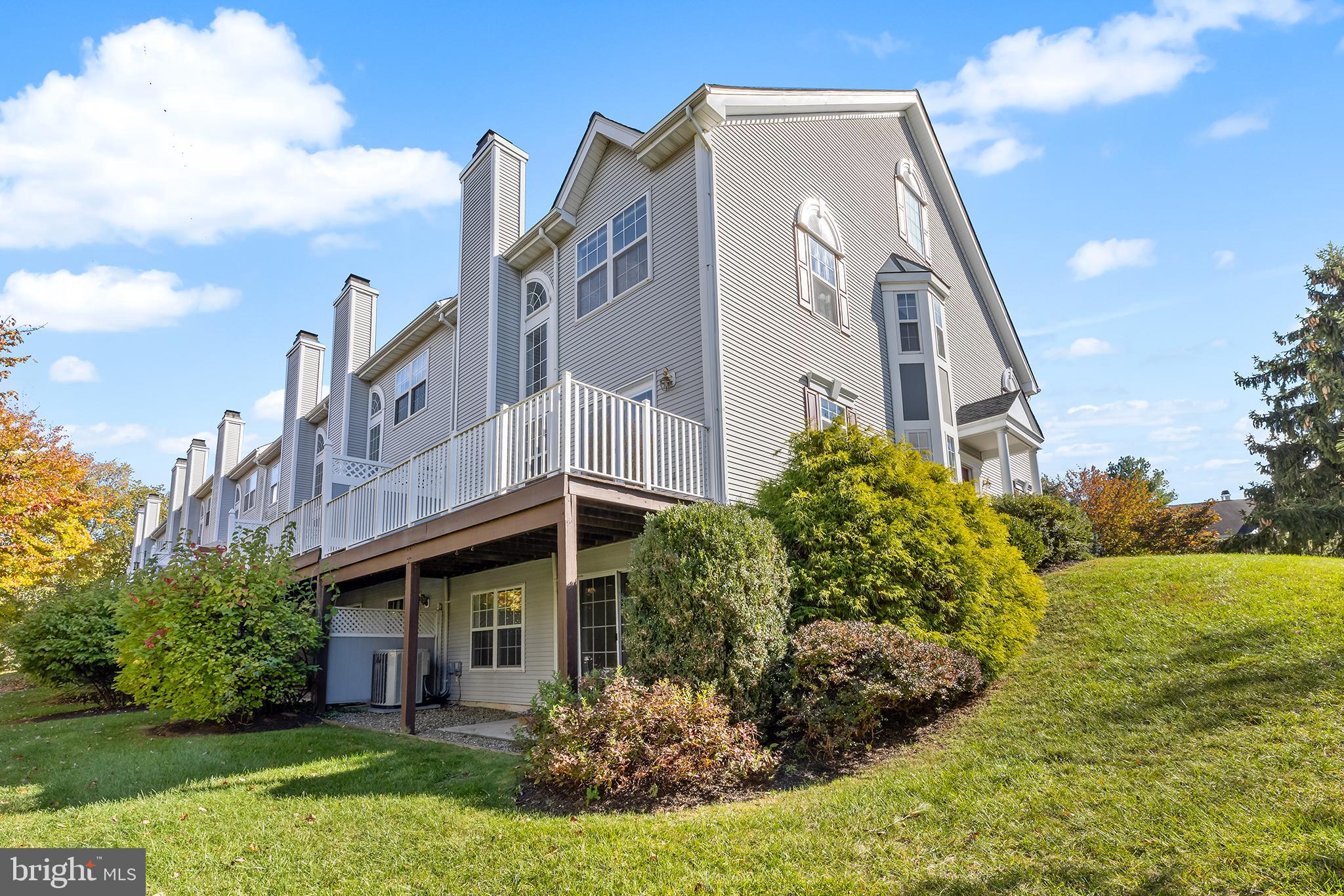 272 Militia Drive Wayne, PA 19087 - Photo 5 of 57 a view of a large white building next to a yard