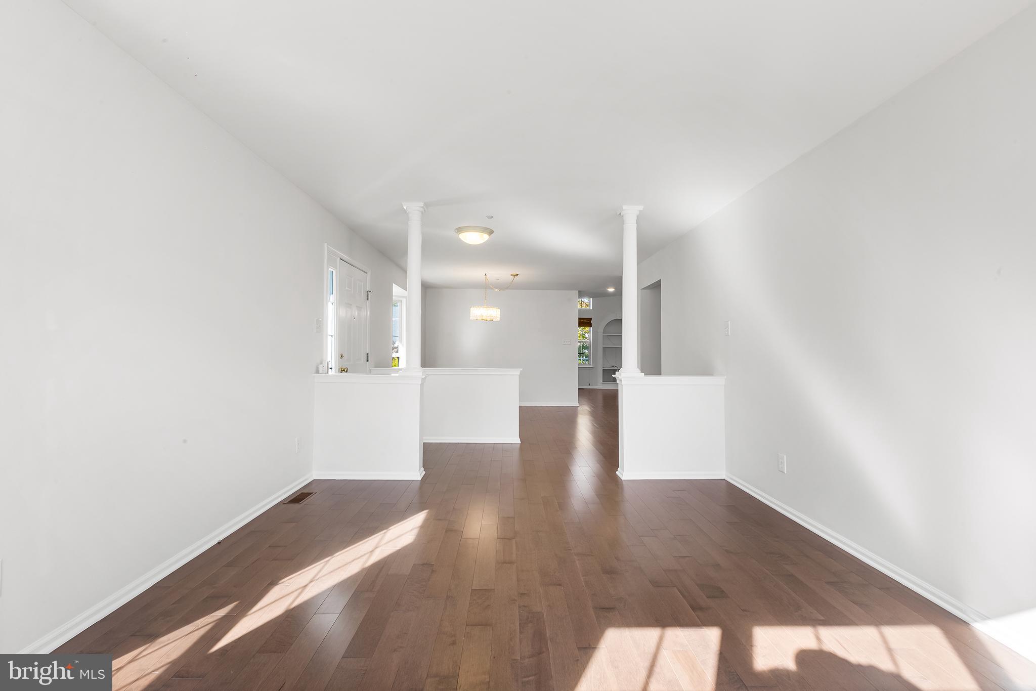 272 Militia Drive Wayne, PA 19087 - Photo 9 of 57 a view of empty room with wooden floor