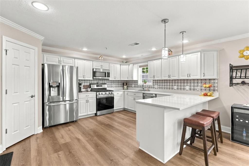 154 Rifgon Drive Canonsburg, PA 15317 - Photo 17 of 42 Stunning, updated eat-in kitchen with an abundance of cabinet and counter space, plus a designated pantry area for additional storage.